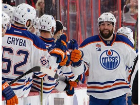 OTTAWA, ON - JANUARY 8: Patrick Maroon #19 of the Edmonton Oilers celebrates his second period goal and second of the game against the Ottawa Senators with team mates on the bench at Canadian Tire Centre on January 8, 2017 in Ottawa, Ontario, Canada.