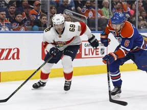 Edmonton's Adam Larsson (6) battles Florida's Jaromir Jagr (68) during the second period of a NHL game between the Edmonton Oilers and the Florida Panthers at Rogers Place in Edmonton on January 18, 2017.