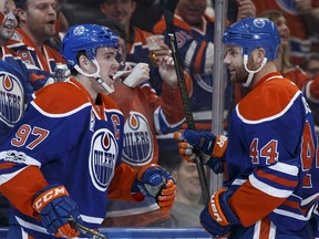 Edmonton's Connor McDavid (97) celebrates Zack Kassian's (44) goal during the first period of a NHL game between the Edmonton Oilers and the Florida Panthers at Rogers Place in Edmonton, Alberta on Wednesday, January 18, 2017.