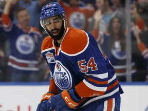 Edmonton Oilers forward Jujhar Khaira celebrates his first NHL goal, scored on Arizona Coyotes goalie Mike Smith, during NHL action at Edmonton's Rogers Place on Jan. 16, 2017.