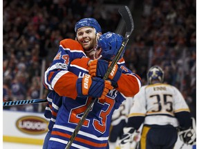 Edmonton's Matt Hendricks (23) celebrates a goal with Zack Kassian (44) during the second period of a NHL game at Rogers Place in Edmonton on Friday, January 20, 2017. Ian Kucerak / Postmedia Photos for Robert Tychkowski, Terry Jones copy in Jan. 21 editions.