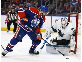 Edmonton's Patrick Maroon (19) is stopped by San Jose's goaltender Martin Jones (31) during the second period of a NHL game between the Edmonton Oilers and the San Jose Sharks at Rogers Place in Edmonton on Jan. 10, 2017.