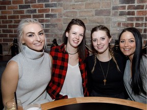 (From left) Kirklanne Lafferty, Courtney Timanson, Erika Makowecki and Sammi Manuel at he opening of the Local Public Eatery's Jasper Ave. location.