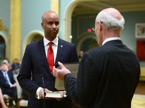 Ahmed Hussen is sworn in as Minister of Immigration, Refugees and Citizenship during a cabinet shuffle at Rideau Hall in Ottawa on Tuesday, Jan 10, 2017.