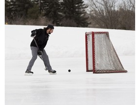 Jesse Jones enjoys a couple of hours of hockey practice by himself on the rink at Hawrelak Park on Wednesday January 18, 2017 in Edmonton.