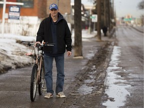Jorg Schlagheck is fighting his ticket for riding his bike on the sidewalk, saying he only did so on an empty sidewalk because the winter road was too dangerous. Here he is pictured on Wednesday, Jan. 19, 2017.