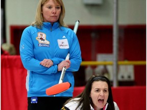 Skip Heather Nedohin, right, yells instructions against Shannon Kleibrink during the 2015 provincial curling championship in Lacombe. (Larry Wong)