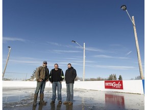 (Left to right) Dean Vestby, Joel Hein and Trent Kenyon, pose for a photo on the unfinished ice rink in Kingman on Thursday, January 26, 2017. Each are supporters of the Rink Of Dreams project that is constructing a NHL sized rink in the rural community.