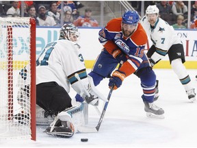 San Jose Sharks' goalie Martin Jones (31) makes the save on Edmonton Oilers' Patrick Maroon (19) during second period NHL action in Edmonton, Alta., on Tuesday January 10, 2017.