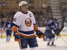 New York Islanders captain John Tavares warms up before this team's game against the host Toronto Maple Leafs on Jan. 7, 2014.