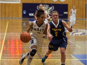 Outstanding NAIT guard Shea-Lynn Noyes drives past Kendal Armstrong of Concordia in recent ACAC action. Both teams will be active this weekend in exhibitions against SAIT and Olds. The Ooks and Thunder will face Medicine Hat and Lethbridge in men’s exhibitions. NAIT coach Todd Warnick will use the female tests as part of preparation for hosting the national women’s championships March 15-18. (Supplied)