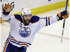 Edmonton Oilers left wing Patrick Maroon (19) celebrates his goal against the Boston Bruins in the third period of an NHL hockey game, Thursday, Jan. 5, 2017, in Boston. It was Maroon's third goal of the game.