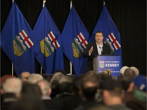 Jason Kenney is welcomed to the stage by Richard Gotfried, MLA Calgary-Fish Creek, at the Hotel Blackfoot in Calgary on Wednesday, Jan. 11, 2017.