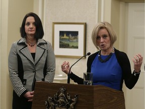 Premier Rachel Notley (at podium) created a new government department for child services when she announced a cabinet shuffle Thursday afternoon January 19, 2017 at Government House in Edmonton. Danielle Larivee (left), who started the day as minister of municipal affairs, is now in charge of the new children's services ministry.