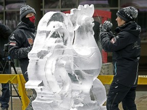 Professional ice carvers Karlis Ile (left) and Maija Puncule, from Latvia, carve six 300 lb. blocks of ice into an 8 foot tall sculpture of a rooster at the Edmonton International Airport on January 23, 2017. The one-of-a-kind ice carving celebrates the Chinese Lunar New Year (Year of the Rooster), which begins on January 28, 2017. This first ice sculpture will kick off Edmonton's Ice on Whyte Festival, held over weekends, January 26 to 29, and February 2 to 5 at End of Steel Park in Old Strathcona.