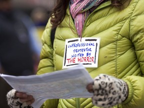 A protester on Pennsylvania Avenue during the inauguration of Donald Trump on January 20, 2017 in Washington, DC.