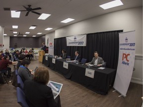 Residents of Fort McMurray listen to the candidates for the leadership of the Progressive Conservative Association of Alberta speak during a leadership townhall meeting at the Royal Canadian Legion in Fort McMurray on Dec. 8, 2016.