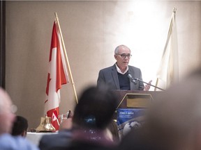 Former mayor Stephen Mandel tells the Rotary Club of Edmonton Monday about the negotiations that led to construction of Rogers Place.