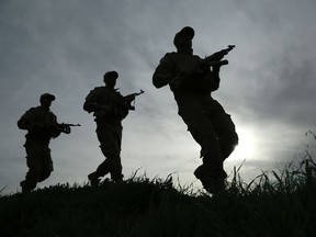 Fighters take part in an obligatory nine month training to join the Autonomous Protection Forces (APF) at a training camp in the northern Syrian town of Rmeilane on March 24, 2016.  The commander-in-chief of the APF says thousands of Kurdish, Arab and Syriac Christian men between the ages of 18 and 30 have completed the compulsory training to joing the APF. For the first two months, conscripts are taught military structure and tactics, and then have lessons on human rights and interaction with civilians. Three stages of training are led by the powerful People's Protection Units (YPG), the military arm of the leading Kurdish Democratic Union Party (PYD).   File photo.