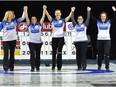 Team Kleibrink, from left, skip Shannon Kleibrink, third Lisa Eyamie, second Sarah Wilkes, lead Alison Thiessen and acting skip Heather Nedohin celebrate after defeating Team Sweeting 6-4 in the final of the Alberta Scotties Tournament of Hearts provincial championship at the St. Albert Curling Club, Sunday, Jan. 29, 2017. (Ed Kaiser)