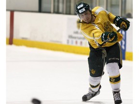 Tyson Baillie takes a shot during University of Alberta Golden Bears practice at Clare Drake Arena on Wednesday, Jan. 11, 2017. Baillie in leads all Canada West Conference freshmen in points. (Ian Kucerak)