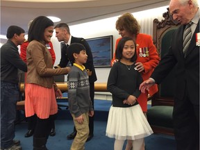 Ten-year-old Jaymie Anareta, her brother Janzel, mother Pretzel and father Jayson greet Alberta Lieutenant Governor Lois Mitchell and other dignitaries at the traditional New Year's Levee in Edmonton 2017.