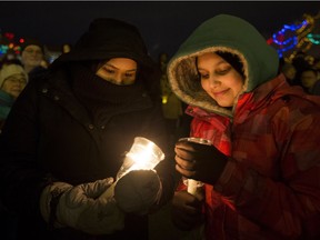 People gathered at the Alberta Legislature Monday, Jan. 30, 2017, to show their support after a shooting occurred in a mosque at the Québec City Islamic cultural center on Sainte-Foy Street.