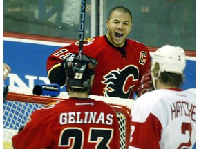 WEDNESDAY, APRIL 28, 2004 PAGE D1 DD
Calgary-04/27/04-Jarome Iginla celebrate the Flames 2nd goal in the second period. Photo by Ted Rhodes/Calgary Herald (For Sports story by Scott Cruickshank) ************************************** Filter: No USM: No File Size: 4.35MB Original file name: 12FD1333.JPG