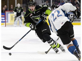 The Edmonton Oil Kings' Artyom Baltruk (9) battles the Kootenay Ice's Brett Davis (22) during third period WHL action at Rogers Place, in Edmonton Wednesday Feb. 15, 2017. The Oil Kings won 3-2 in overtime.