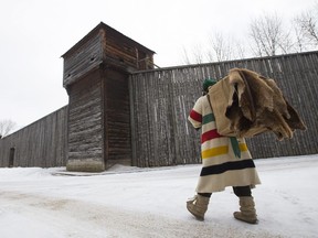 Historical costume interpreter Charles Daniel poses for a photo at Fort Edmonton Park, in Edmonton Friday, Feb. 24, 2017. Joseph Lewis, possibly the first black fur trader in Alberta, lived in the province from 1799 to 1820.