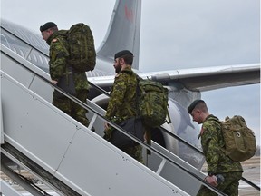 About 100 soldiers from 1 Canadian Mechanized Brigade Group depart from the International Airport to be deployed to Poland for six months as part of Operation Reassurance to support NATO, in Edmonton, Wednesday, February 22, 2017.