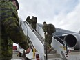 Approximately 100 soldiers from 1 Canadian Mechanized Brigade Group depart from the Edmonton International Airport on Wednesday, Feb. 22, 2017 to be deployed to Poland for six months as part of Operation Reassurance to support NATO.