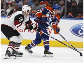Arizona's Michael Stone (26) chases Edmonton's Ryan Nugent-Hopkins (93) during the second period of a NHL game between the Edmonton Oilers and the Arizona Coyotes at Rogers Place in Edmonton, Alberta on Monday, January 16, 2017. The Oilers host the Coyotes again on Tuesday.