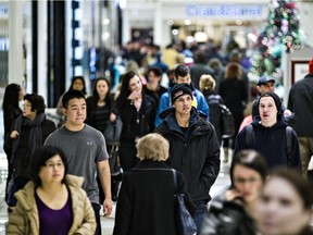 Crowds make their way through the mall during Boxing Day at Southgate Centre. File photo.