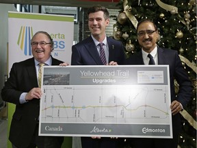 Brian Mason (left/Alberta Minister of Infrastructure and Minister of Transportation), Don Iveson (middle/Mayor of Edmonton) and Amarjeet Sohi (right/Canada Minister of Infrastructure and Communities) pose for a photo after announcing in Edmonton on Dec. 16, 2016 the joint government funding of more than $1 billion for the conversion of a portion of Highway 16, also know as the Yellowhead Trail, from an expressway into a freeway without traffic signals.