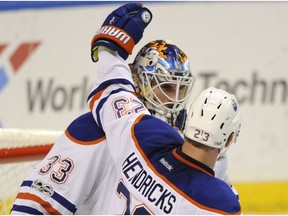 Edmonton Oilers goalie Cam Talbot is congratulated by Matt Hendricks after their 2-1 win over the St. Louis Blues on Tuesday, Feb. 28, 2017, in St. Louis. (Bill Boyce/AP Photo)
