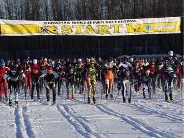 Cross-country skiers leave the starting line of the Canadian Birkebeiner at the Ukrainian Cultural Heritage Village east of Edmonton, Saturday, Feb. 11, 2017.