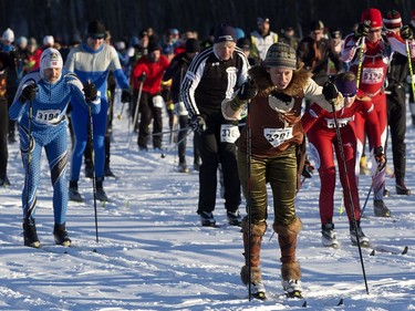 Cross-country skiers leave the starting line of the Canadian Birkebeiner at the Ukrainian Cultural Heritage Village east of Edmonton on Saturday, Feb. 11, 2017.