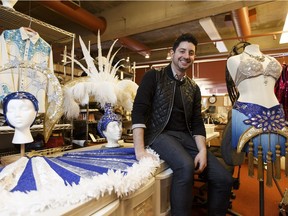 Crazy For You's set and costume designer Cory Sincennes poses with some of the 200 costumes he's helped create at the Citadel Theatre in Edmonton on Monday, February 27, 2017.