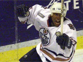 Georges Laraque celebrates his hat-trick goal at Skyreach Centre against the L.A. Kings on Feb. 21, 2000.