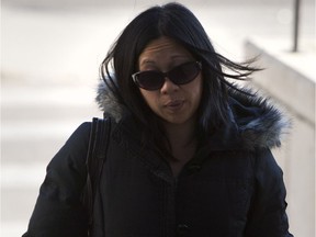 Lily Choy walks into the courthouse on Oct. 21, 2011, for sentencing after being found guilty of manslaughter in the death of three-year-old Kawliga Potts. The death is now the subject of a fatality inquiry.