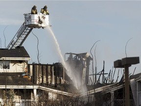 Edmonton firefighters battle a blaze that started on the third floor at Westridge Estates in Edmonton on Thursday, Feb. 16, 2017. The investigation has been turned over to Edmonton police.