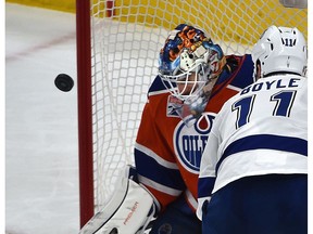 Edmonton Oilers goalie Cam Talbot makes a save on Tampa Bay Lightning Brian Boyle at Rogers Place in Edmonton on Dec. 17, 2016. (Ed Kaiser)