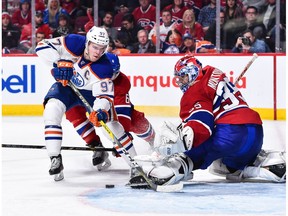 Goaltender Al Montoya #35 of the Montreal Canadiens makes a pad save on Connor McDavid #97 of the Edmonton Oilers during the NHL game at the Bell Centre on February 5, 2017 in Montreal. The Oilers returned to practice on Friday after their five-day bye.