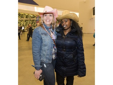 Garth Brooks fans  Amanda Ens and Nyree Tasco head into the first of 9 shows on Friday February 17, 2017 in Edmonton.  Greg  Southam / Postmedia  (To go with a Catherine Griwkowsky story.)