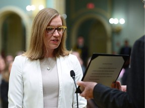 Karina Gould is sworn in as Minister of Democratic Institutions during a cabinet shuffle at Rideau Hall in Ottawa on Tuesday, Jan 10, 2017. report on the federal government's online electoral reform survey says two-thirds of Canadians who responded are happy with how the current voting system works.The report, quietly released online today by Gould, also suggests Canadians are willing to entertain changes to the system - provided they don't complicate the voting process.
