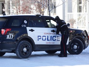 Police investigate a shooting near 158 Street and Sutter Place in southwest Edmonton on Feb. 8, 2017.
