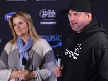 Garth Brooks and Trisha Yearwood speak to the media at a news conference in Edmonton on Feb. 17, 2017.