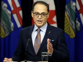 Finance Minister Joe Ceci announced in Edmonton on Feb. 24, 2017, that the Alberta government is cutting salaries and eliminating bonuses for the highest paid top executives of agencies, boards and commissions.