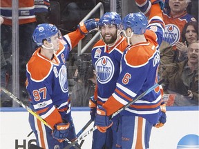 Edmonton Oilers right wing Jordan Eberle (14) centre Connor McDavid Edmonton Oilers right wing Jordan Eberle (14) centre Connor McDavid (97) and left wing Patrick Maroon (19) celebrate a goal against the Arizona Coyotes at Rogers Place on Tuesday February 14, 2017.